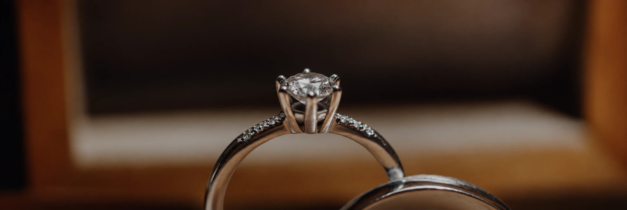 A solitaire ring in warm light
